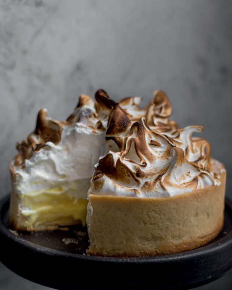 Tangy gluten-free lemon meringue pie with silky lemon curd and fluffy toasted meringue — bright, zesty, and perfectly bala