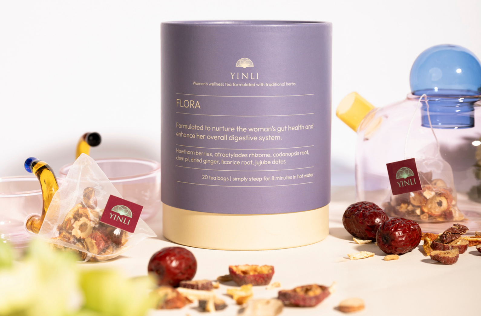 Yinli Flora product with ingredients on a white background