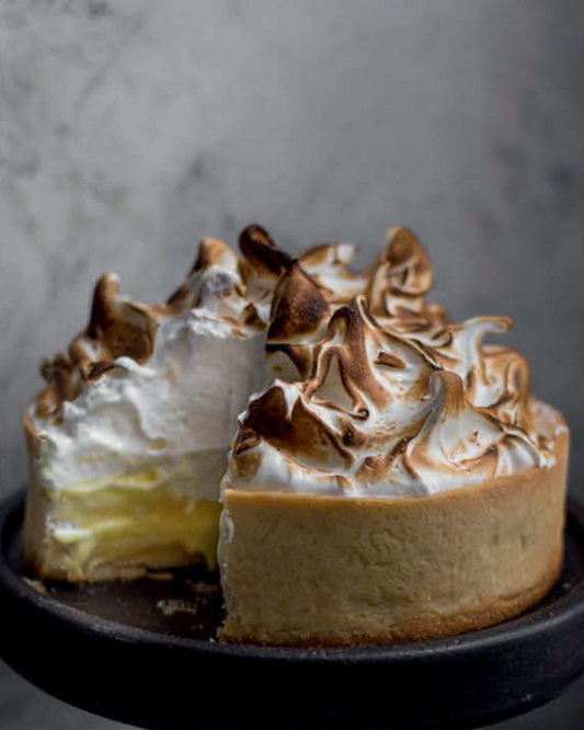 Tangy gluten-free lemon meringue pie with silky lemon curd and fluffy toasted meringue — bright, zesty, and perfectly bala