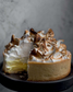 Tangy gluten-free lemon meringue pie with silky lemon curd and fluffy toasted meringue — bright, zesty, and perfectly bala