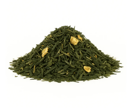 Pile of green tea leaves with gold leaf on a white background